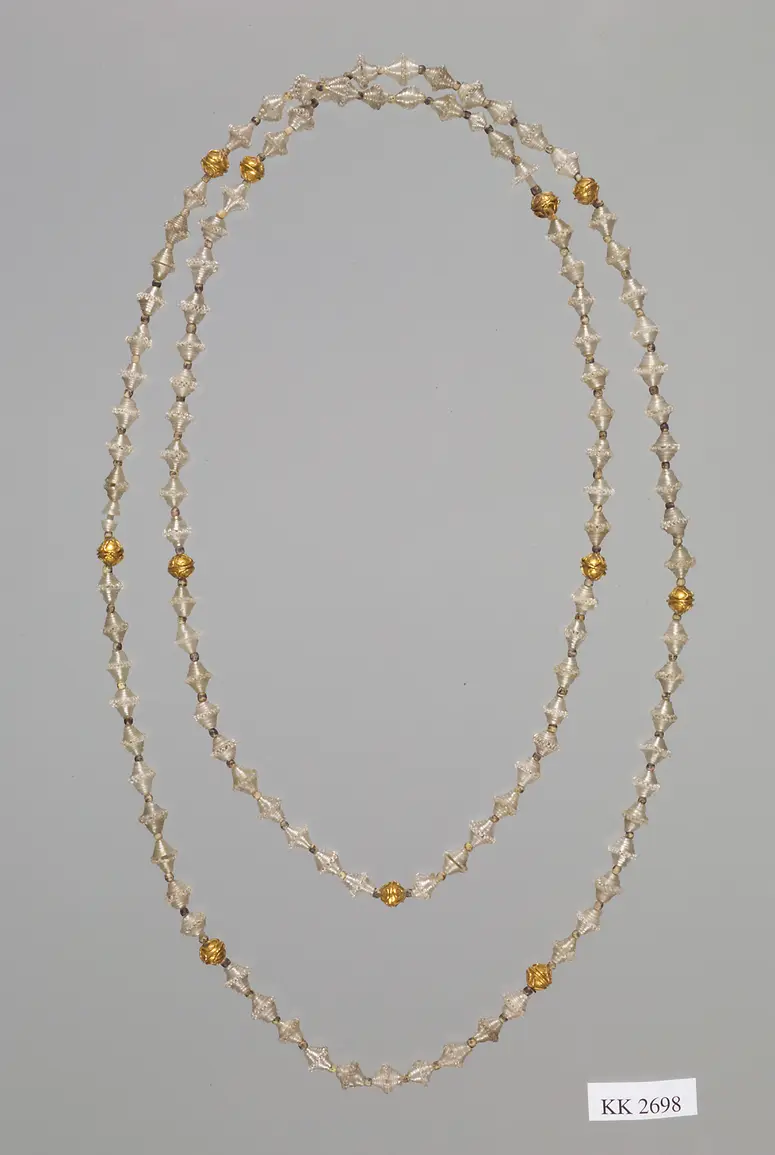 Kette aus Glas und Goldknöpfen