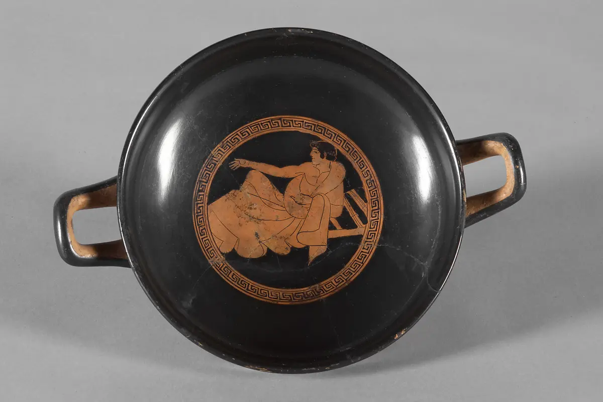 Jüngling beim Gelage