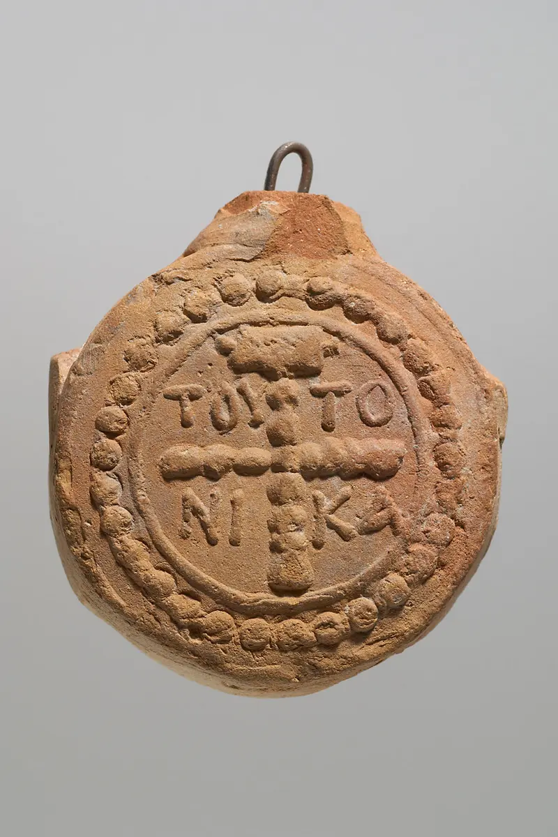 Kreuz und Inschrift